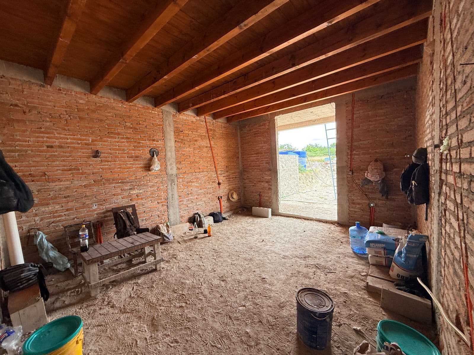 Casa Sanmiguelense — Las Campanas, San Miguel de Allende — photo 11 — rustic exposed brick with soaring beams