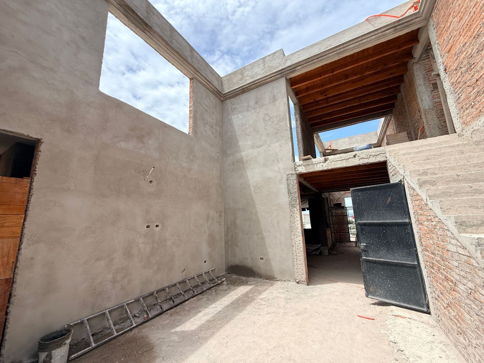 Casa Sanmiguelense — Las Campanas, San Miguel de Allende — photo 8 — rustic courtyard with soaring ceilings