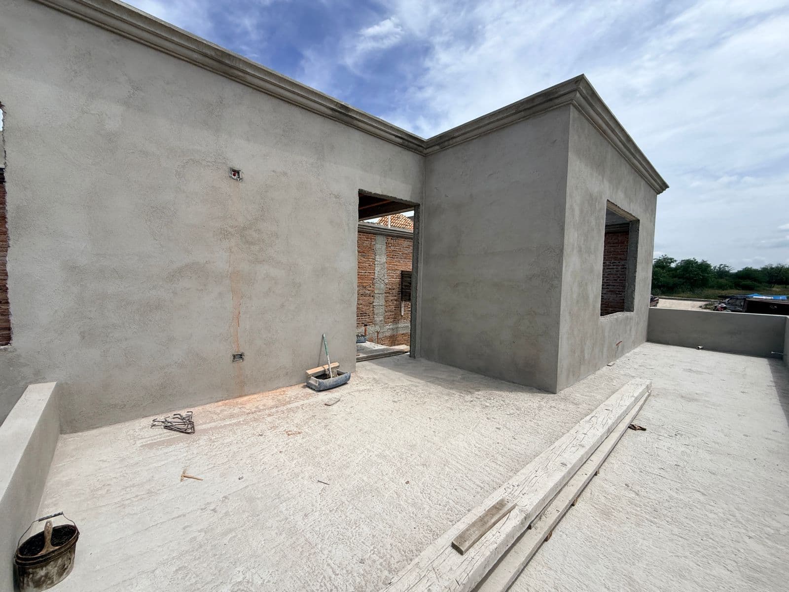 Casa Sanmiguelense — Las Campanas, San Miguel de Allende — photo 3 — modern minimalist courtyard awaits finishing touches