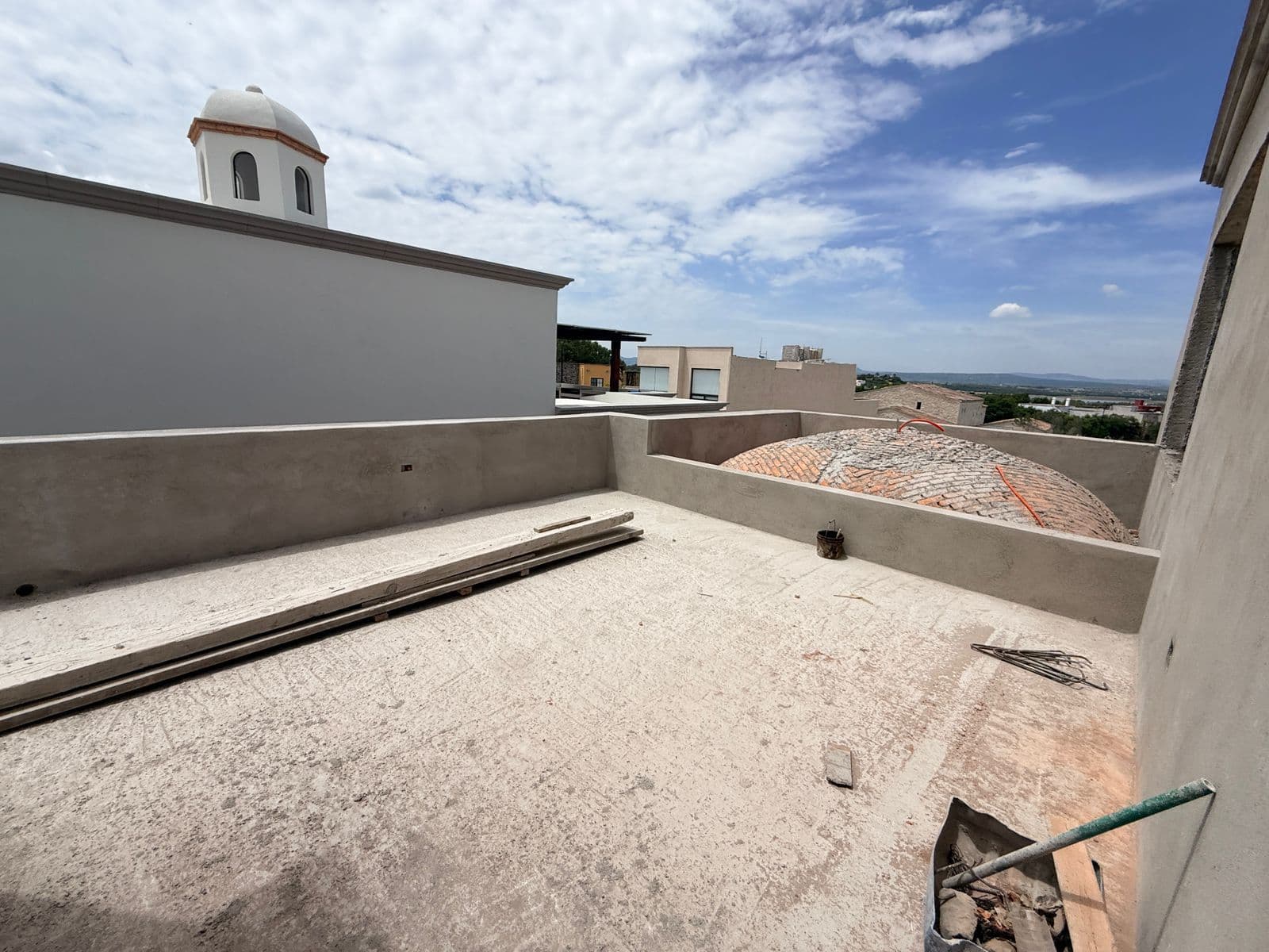 Casa Sanmiguelense — Las Campanas, San Miguel de Allende — photo 4 — expansive rooftop terrace with panoramic views