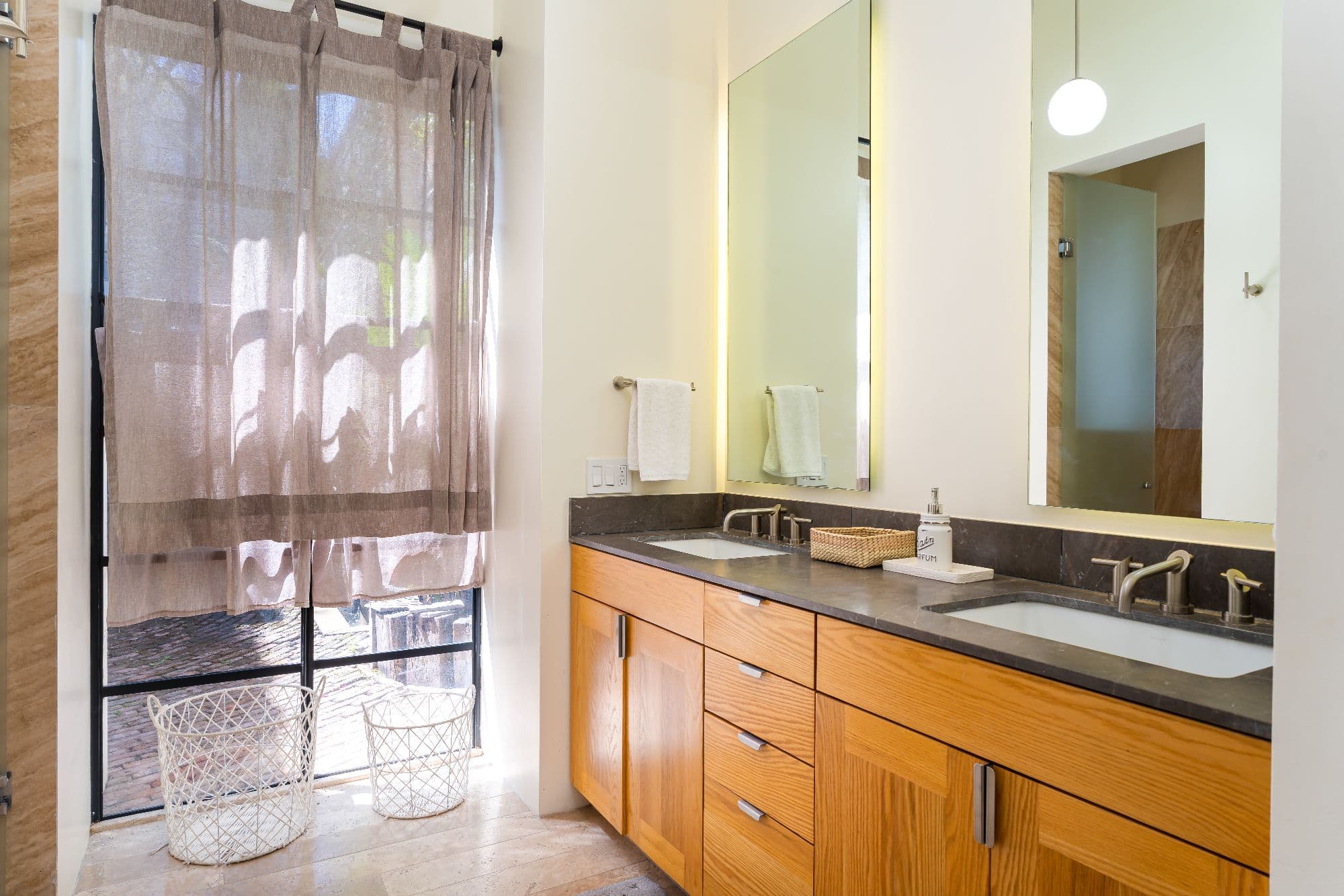 Casa Organza — Centro, San Miguel de Allende — photo 22 — spa-like master bath with garden views