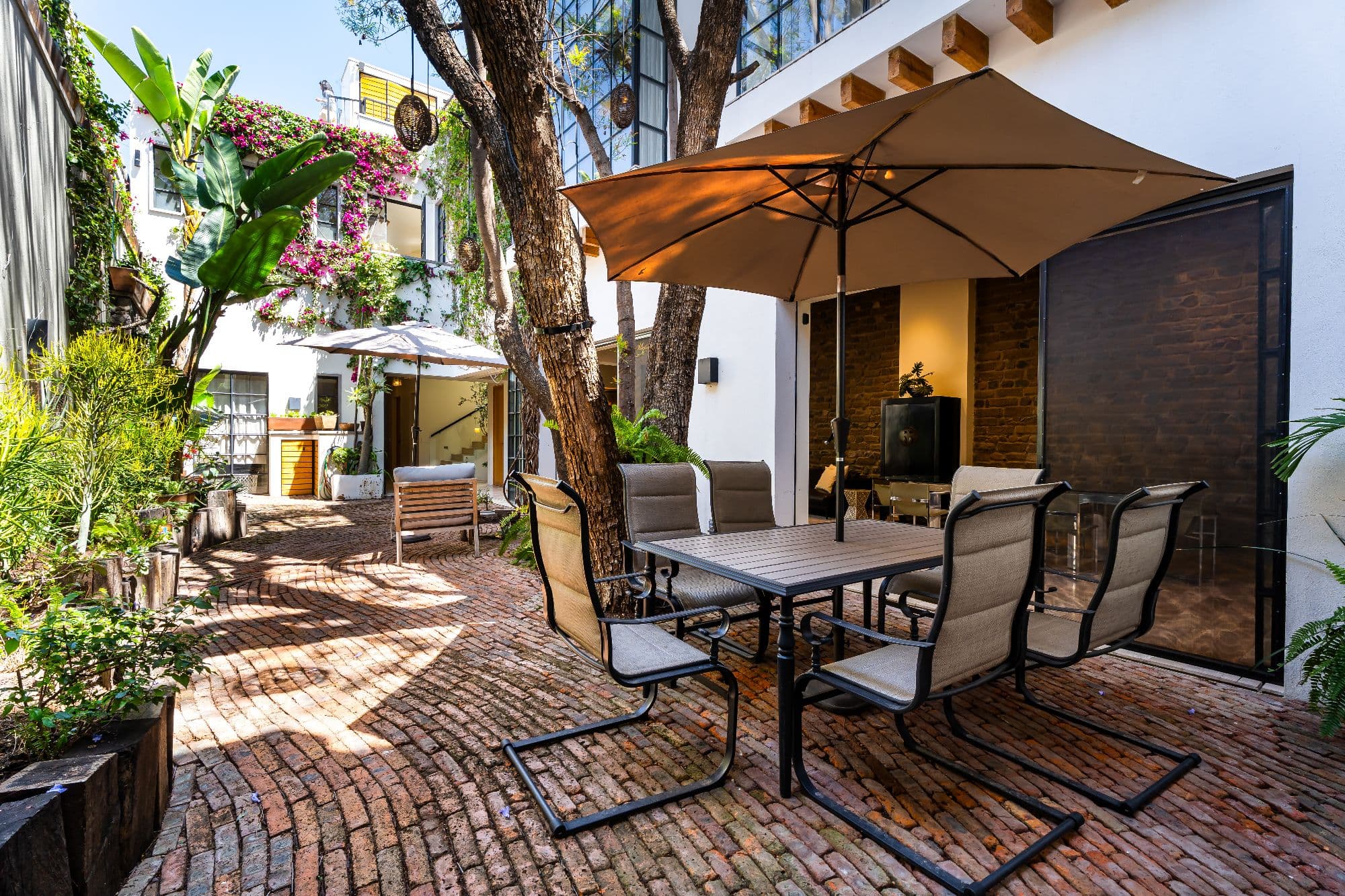 Casa Organza — Centro, San Miguel de Allende — photo 13 — serene courtyard with mature shade trees