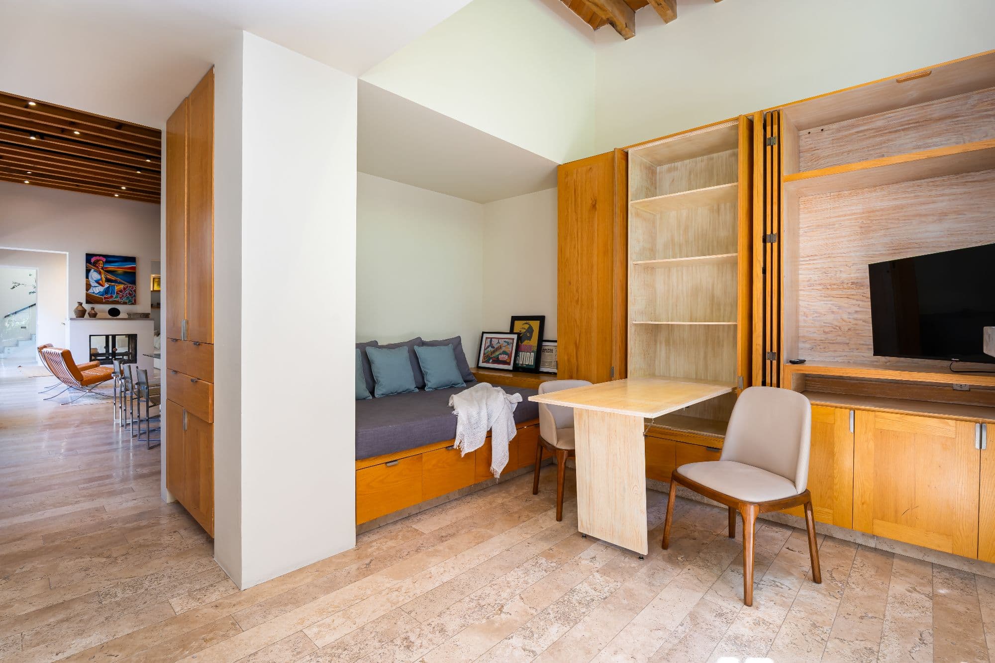 Casa Organza — Centro, San Miguel de Allende — photo 16 — sophisticated wood-paneled bedroom suite