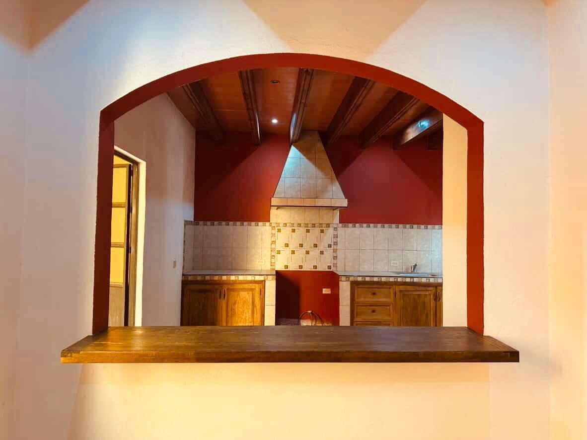 Casa La Lomita — La Lomita, San Miguel de Allende — photo 25 — charming arched kitchen, rustic elegance