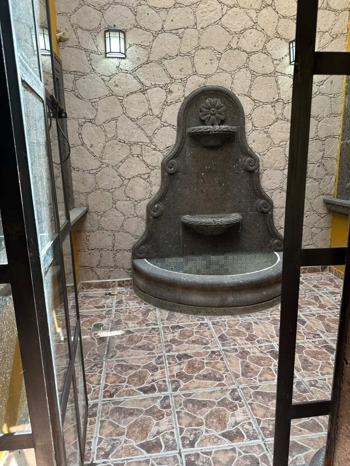 Casa La Lomita — La Lomita, San Miguel de Allende — photo 23 — charming courtyard fountain, authentic colonial elegance