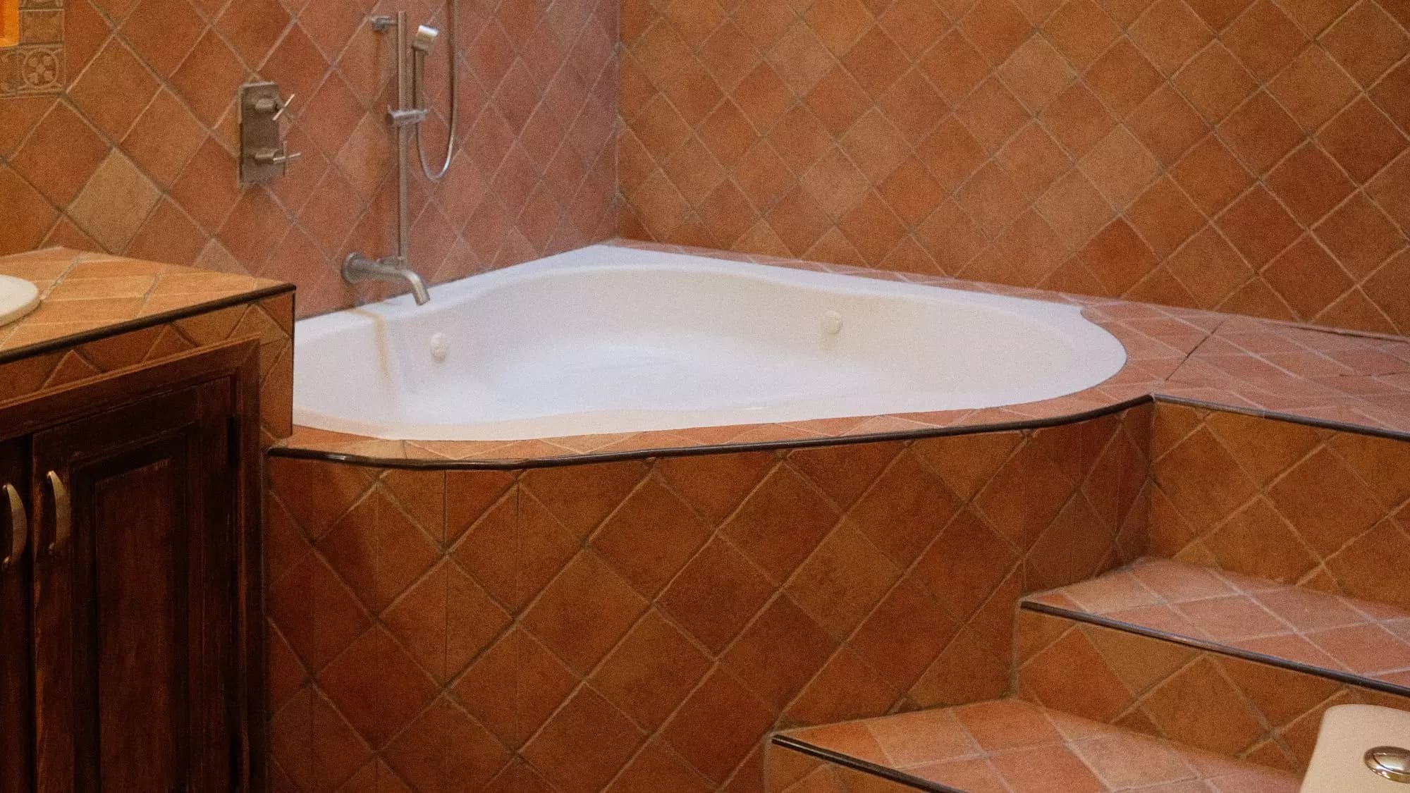 Casa La Lomita — La Lomita, San Miguel de Allende — photo 8 — luxurious sunken spa with terracotta elegance
