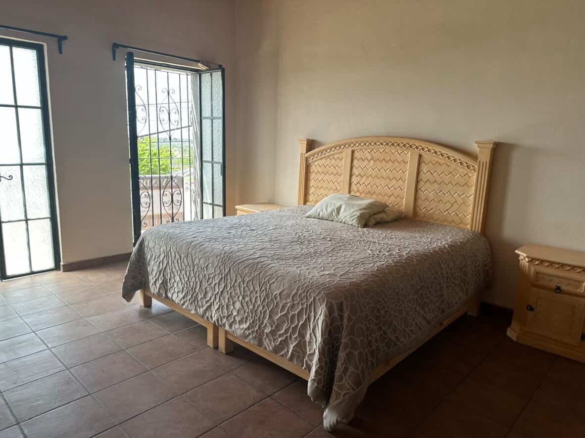 Casa La Lomita — La Lomita, San Miguel de Allende — photo 20 — sunlit bedroom with colonial charm