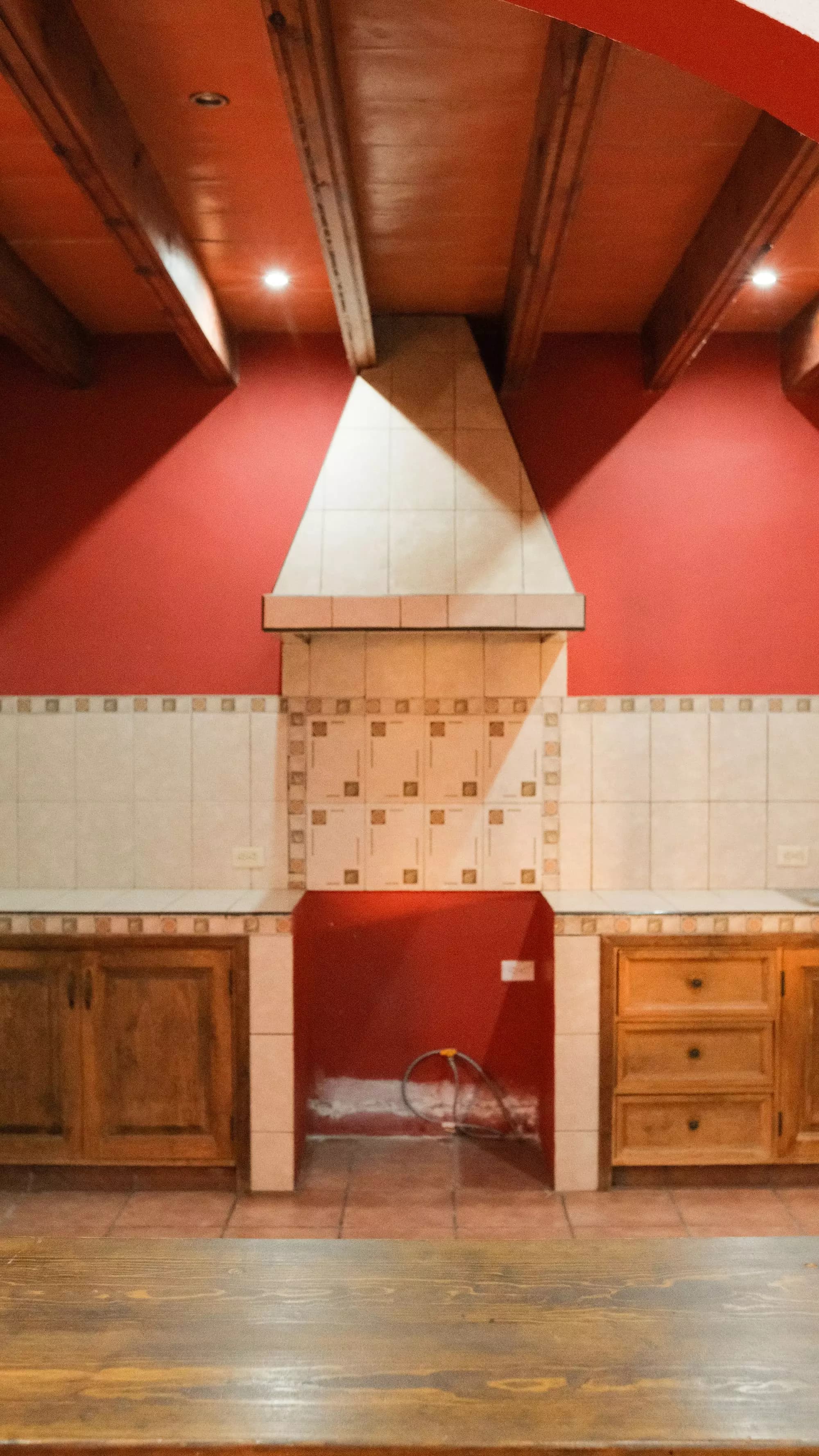 Casa La Lomita — La Lomita, San Miguel de Allende — photo 7 — dramatic vaulted fireplace, rustic elegance