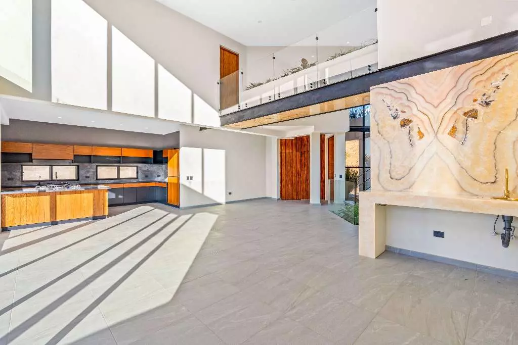 Casa De La Vista — Residencial Malanquin la Mesa, San Miguel de Allende — photo 5 — luminous open-concept living with soaring ceilings