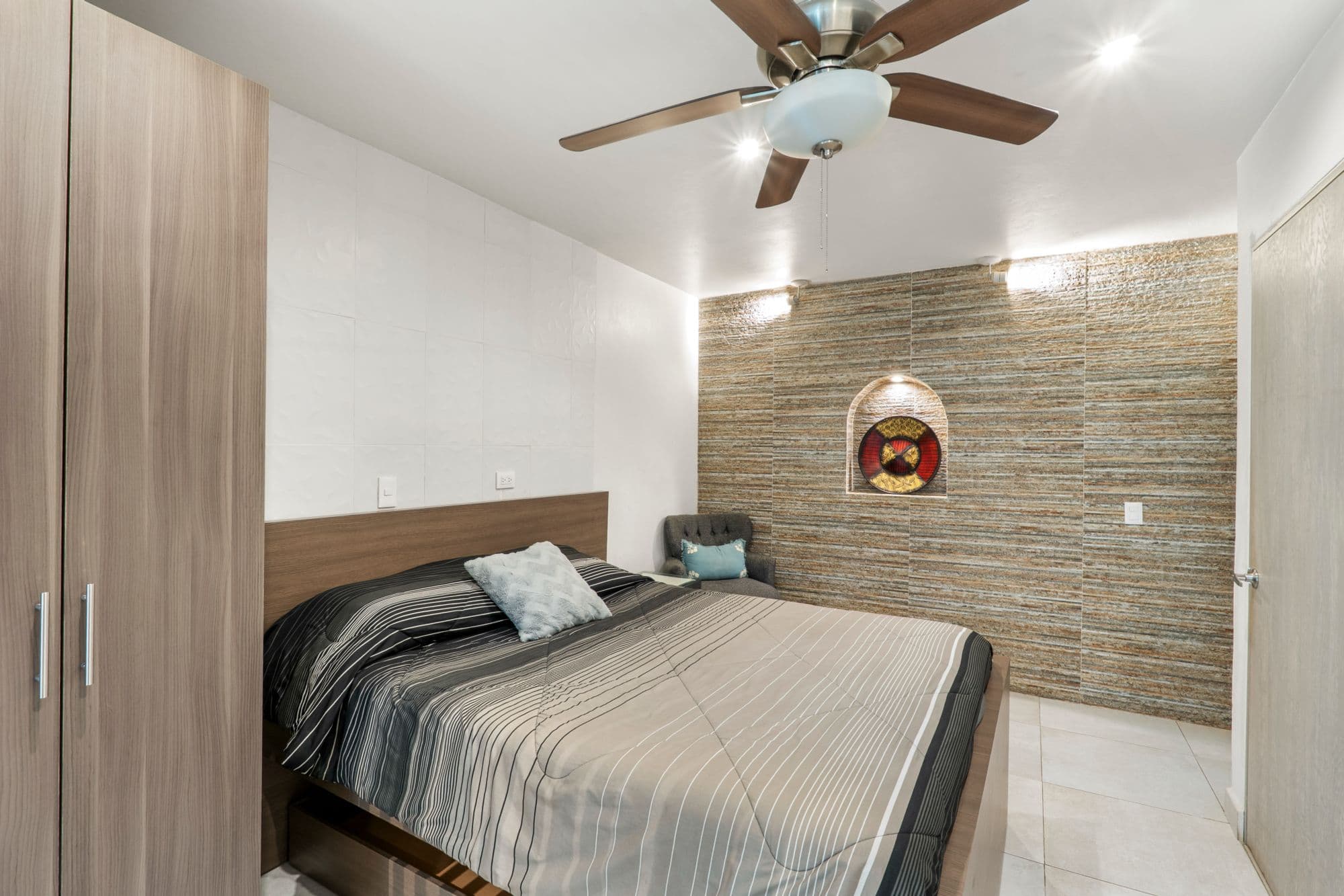 Depas Oratorio — Centro, San Miguel de Allende — photo 7 — modern master suite, textured stone walls