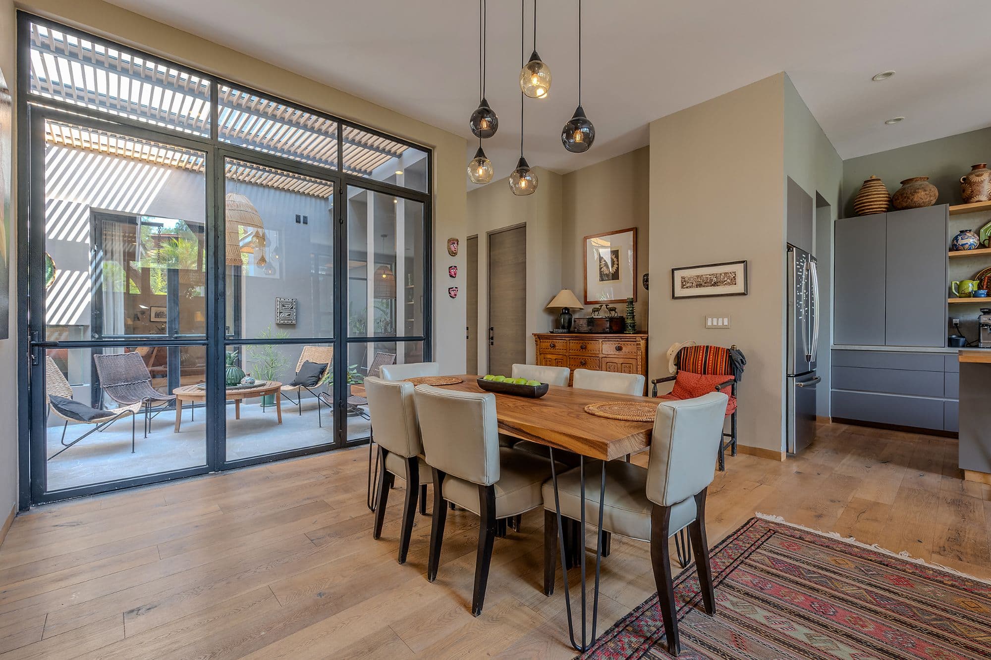Casa Pirules — Centro, San Miguel de Allende — photo 21 — luminous dining space, seamless indoor-outdoor living