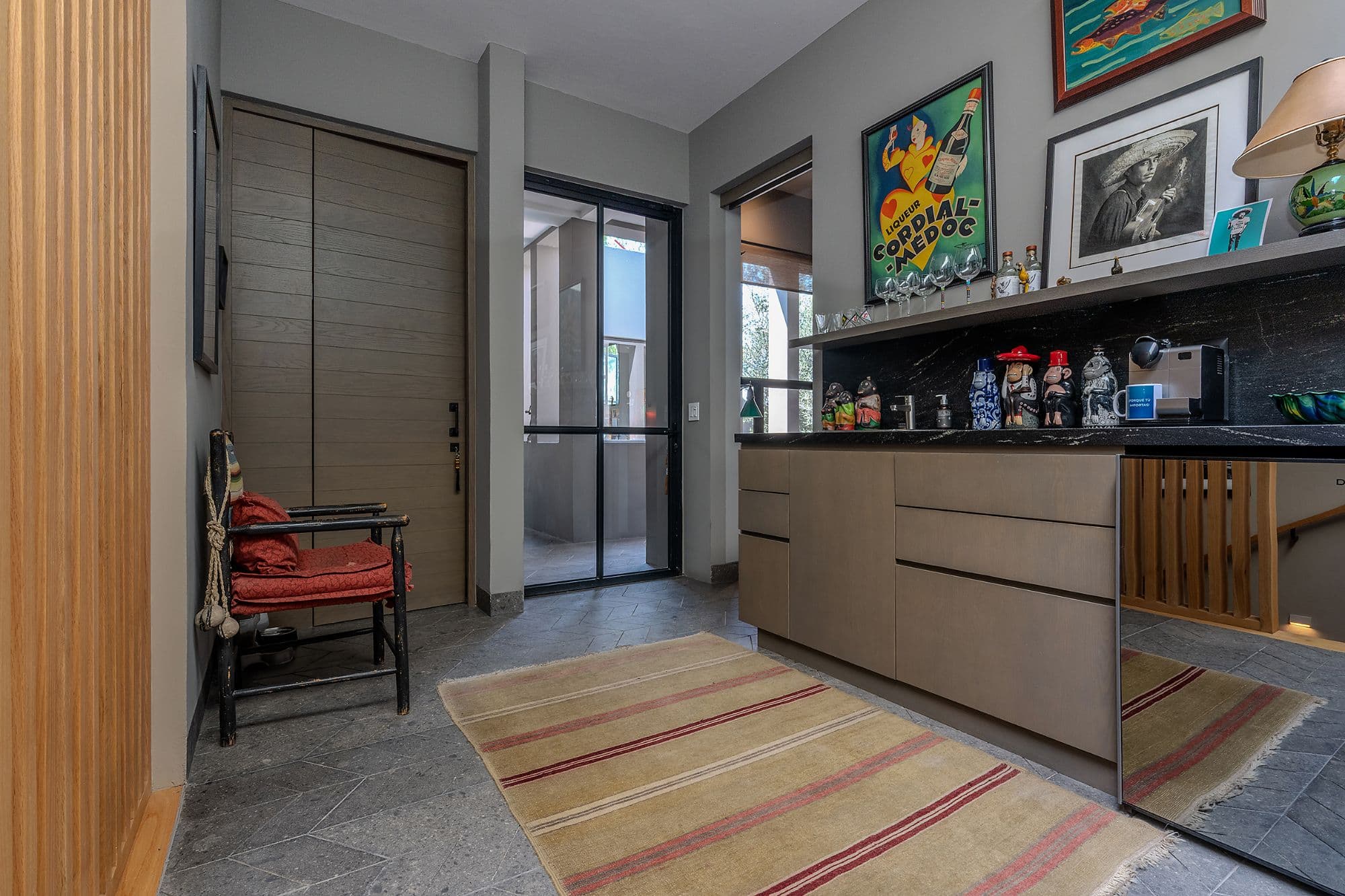 Casa Pirules — Centro, San Miguel de Allende — photo 27 — sophisticated entry foyer with curated art collection