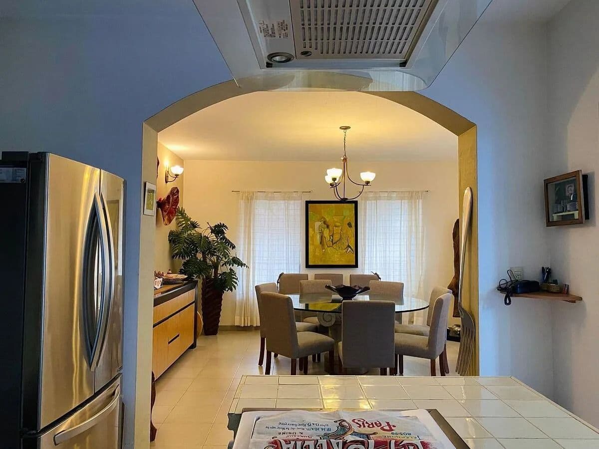 Casa Magenta — El Paraiso, San Miguel de Allende — photo 16 — luminous open-concept living, warm archway elegance