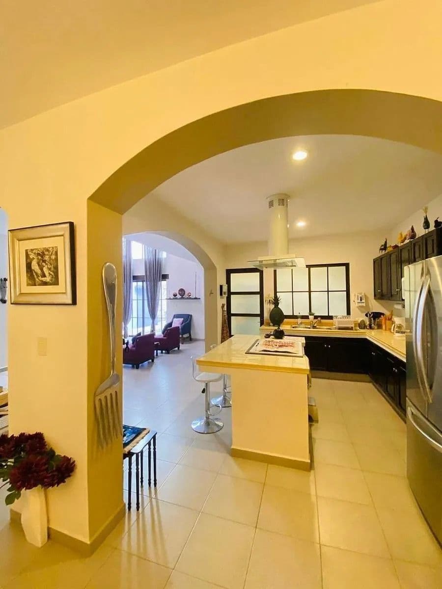 Casa Magenta — El Paraiso, San Miguel de Allende — photo 9 — luminous chef's kitchen, sophisticated archways