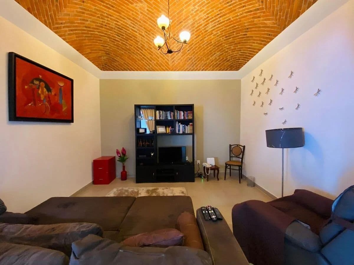 Casa Magenta — El Paraiso, San Miguel de Allende — photo 11 — sophisticated living space, vaulted ceilings