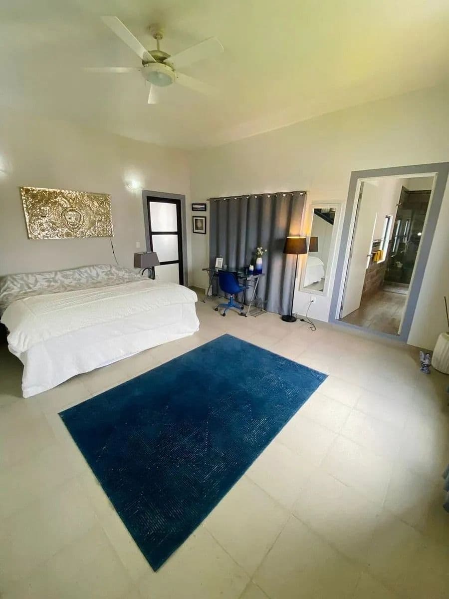 Casa Magenta — El Paraiso, San Miguel de Allende — photo 2 — spacious, light-filled master bedroom suite