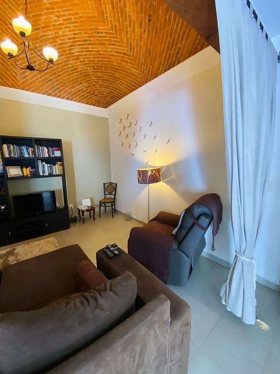 Casa Magenta — El Paraiso, San Miguel de Allende — photo 13 — warm brick ceiling, sophisticated entertaining space