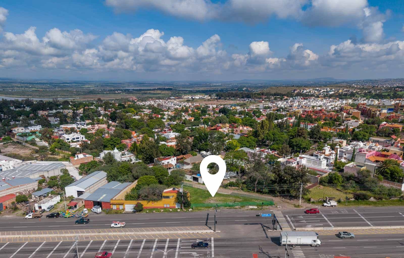 Corner Lot Opportunity — Poblado de Don Diego, San Miguel de Allende — photo 5 — expansive valley views, thriving community landscape