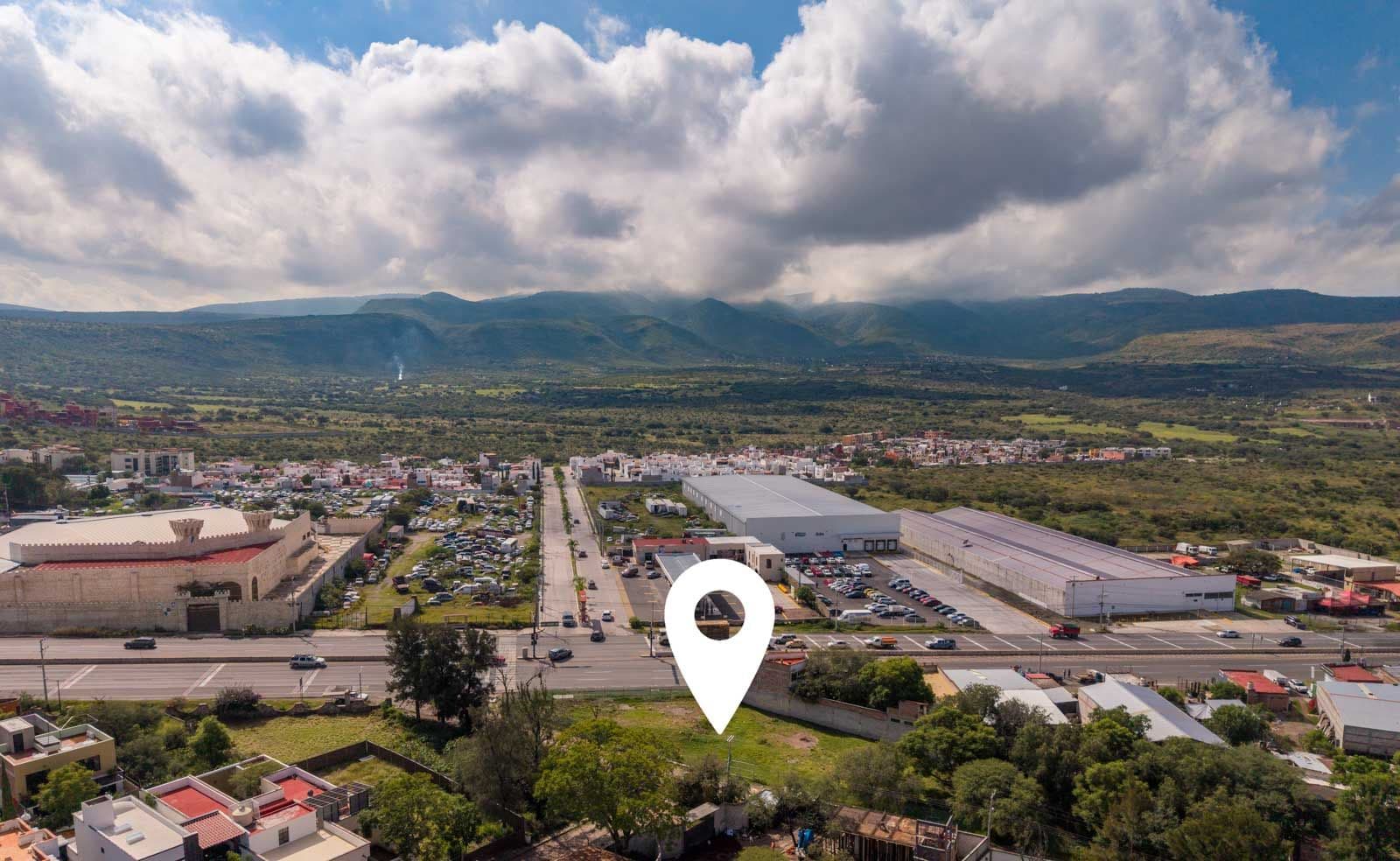 Corner Lot Opportunity — Poblado de Don Diego, San Miguel de Allende — photo 4 — panoramic valley views, modern industrial charm