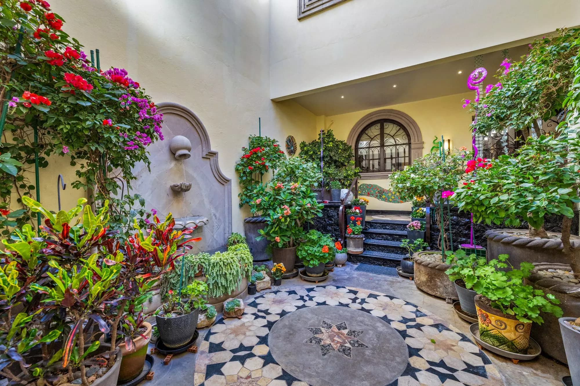 Casa Nueva Aventura — Guadiana, San Miguel de Allende — photo 3 — enchanting courtyard, vibrant blooming sanctuary