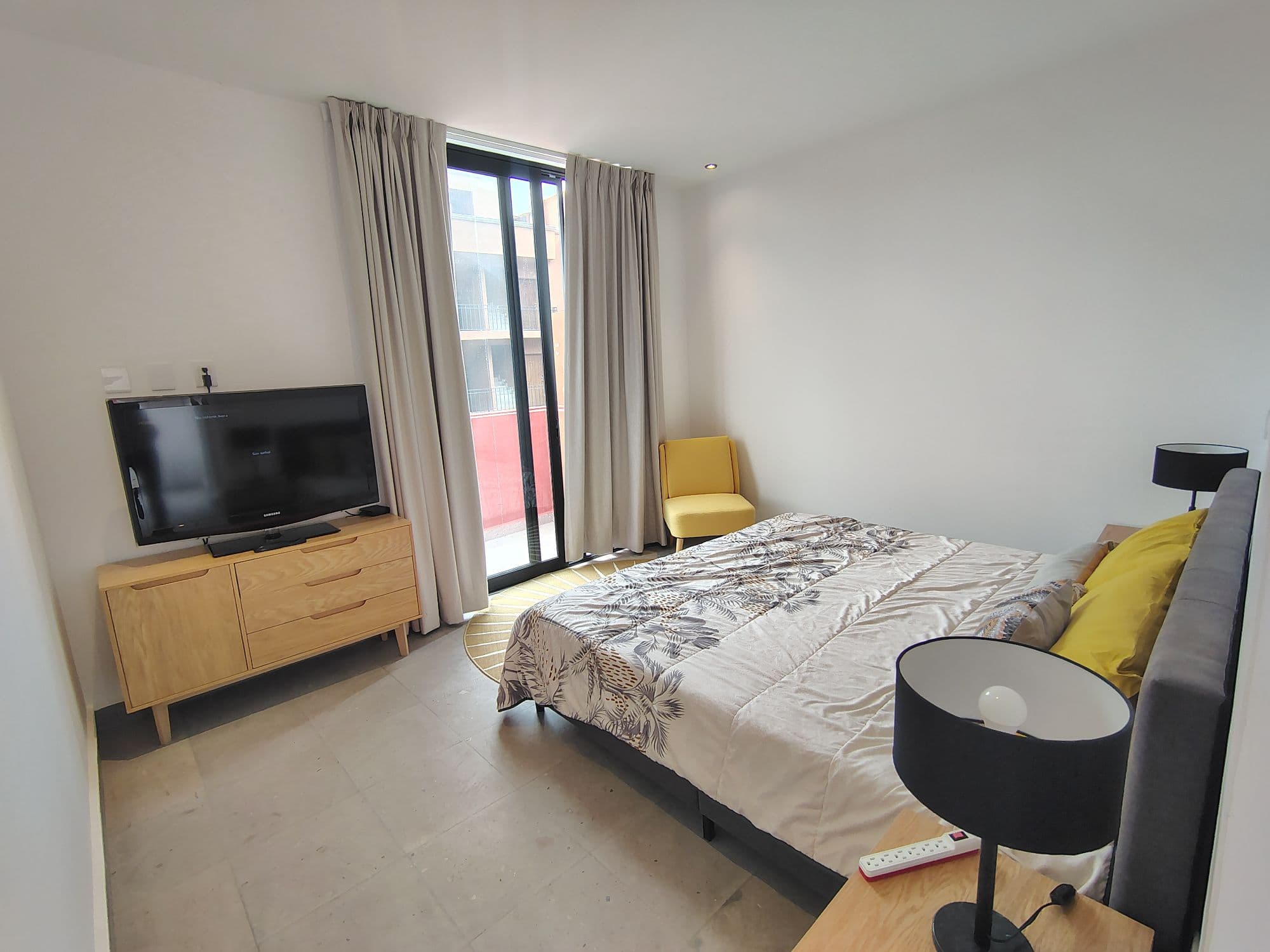 NUBE A 101 SAN FRANCISCO — San Miguel de Allende Centro, San Miguel de Allende — photo 14 — serene contemporary bedroom, radiant natural light