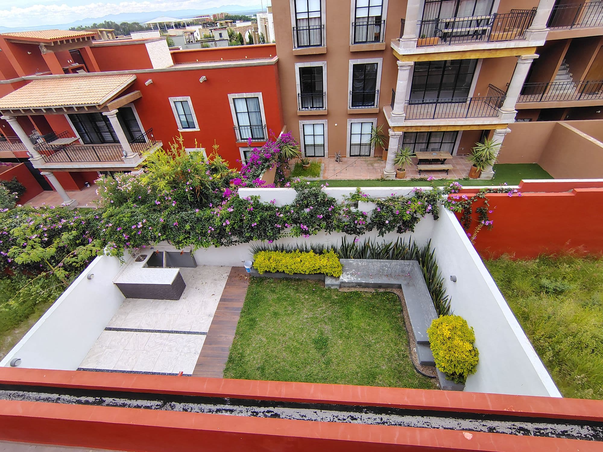 NUBE A 101 SAN FRANCISCO — San Miguel de Allende Centro, San Miguel de Allende — photo 21 — vibrant rooftop oasis with mature gardens