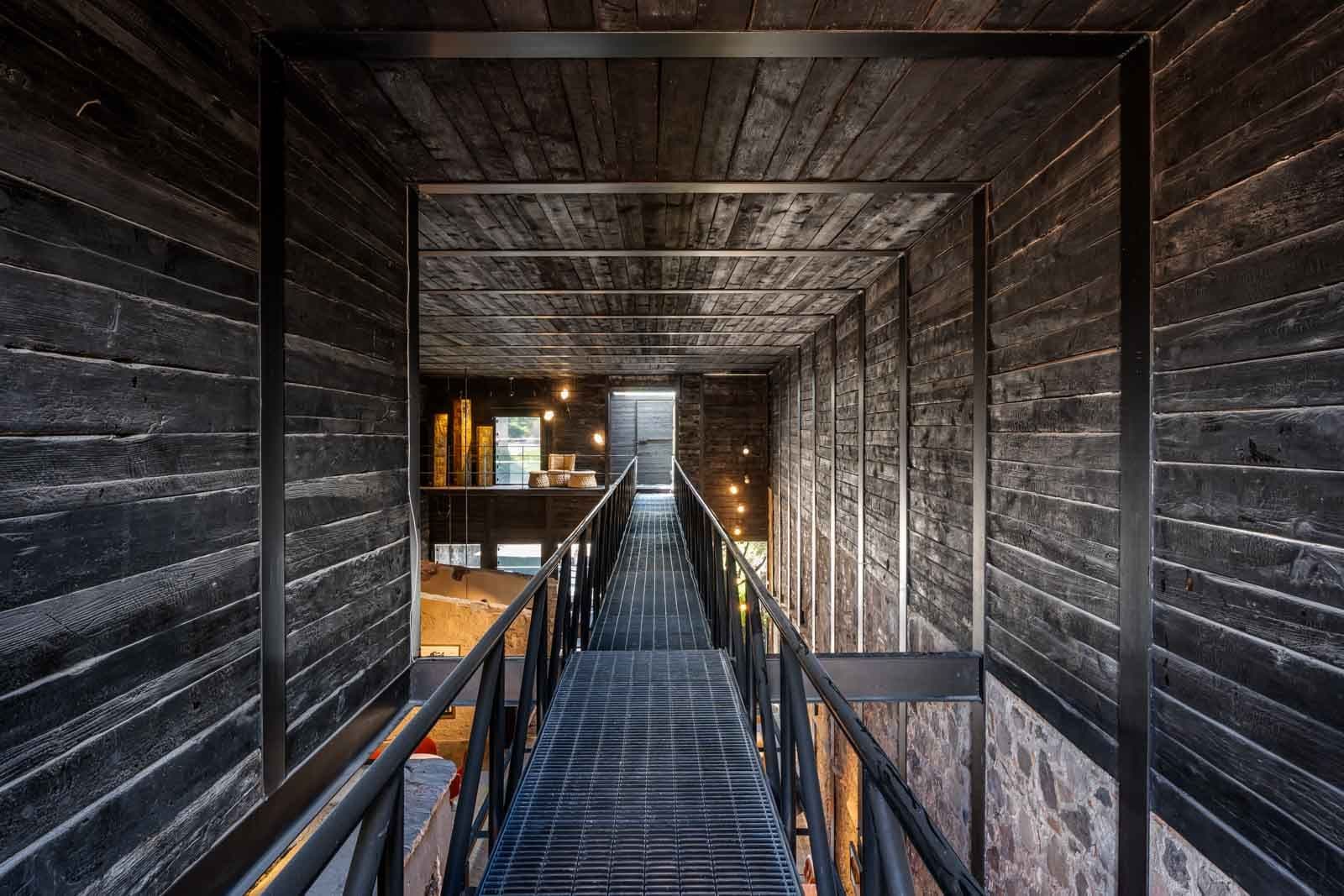 Casa Umbral — Centro, San Miguel de Allende — photo 17 — industrial-chic mezzanine with soaring timber beams
