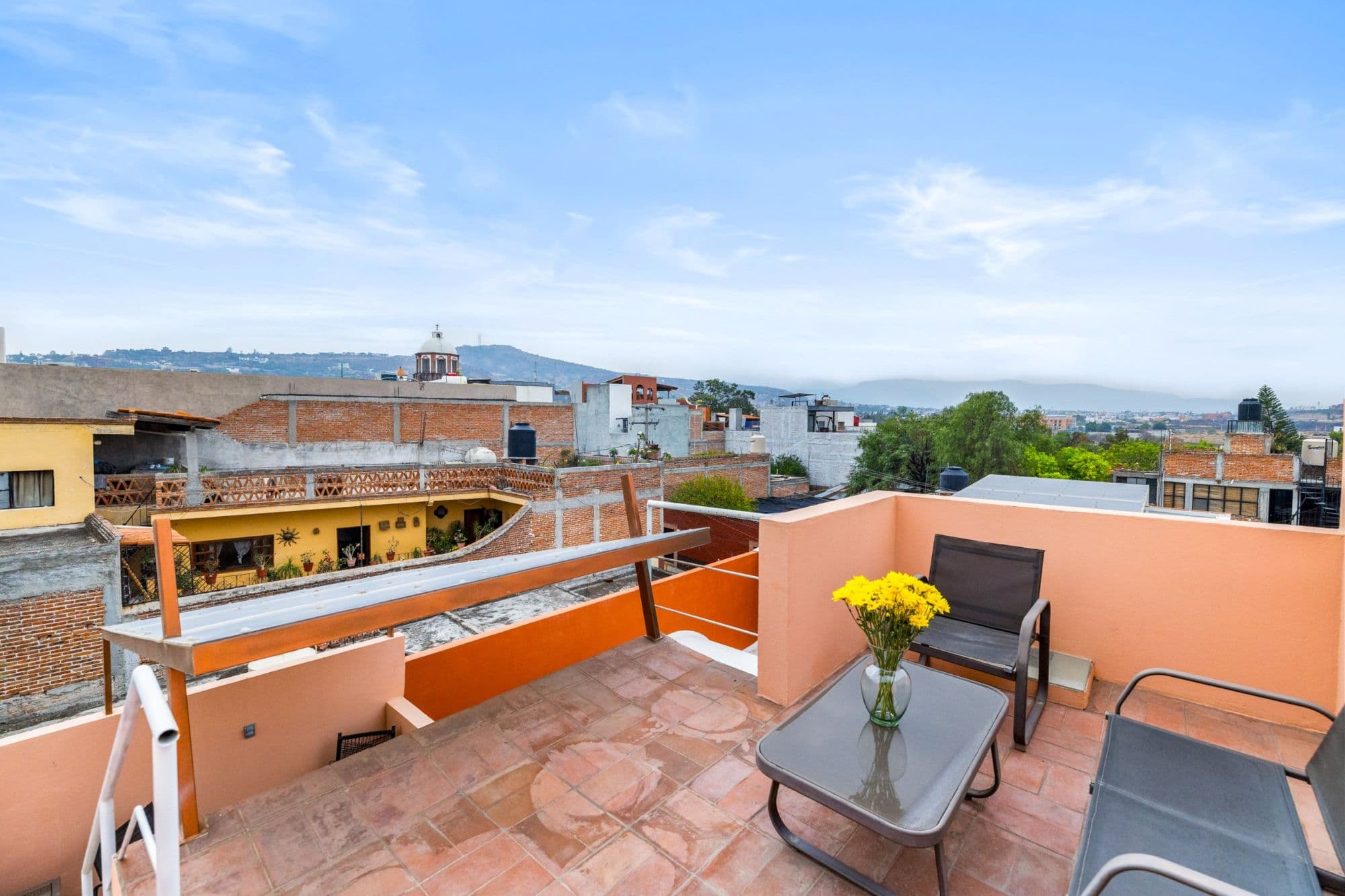 Casa la Luz — San Antonio, San Miguel de Allende — photo 10 — panoramic rooftop terrace, mountain vistas