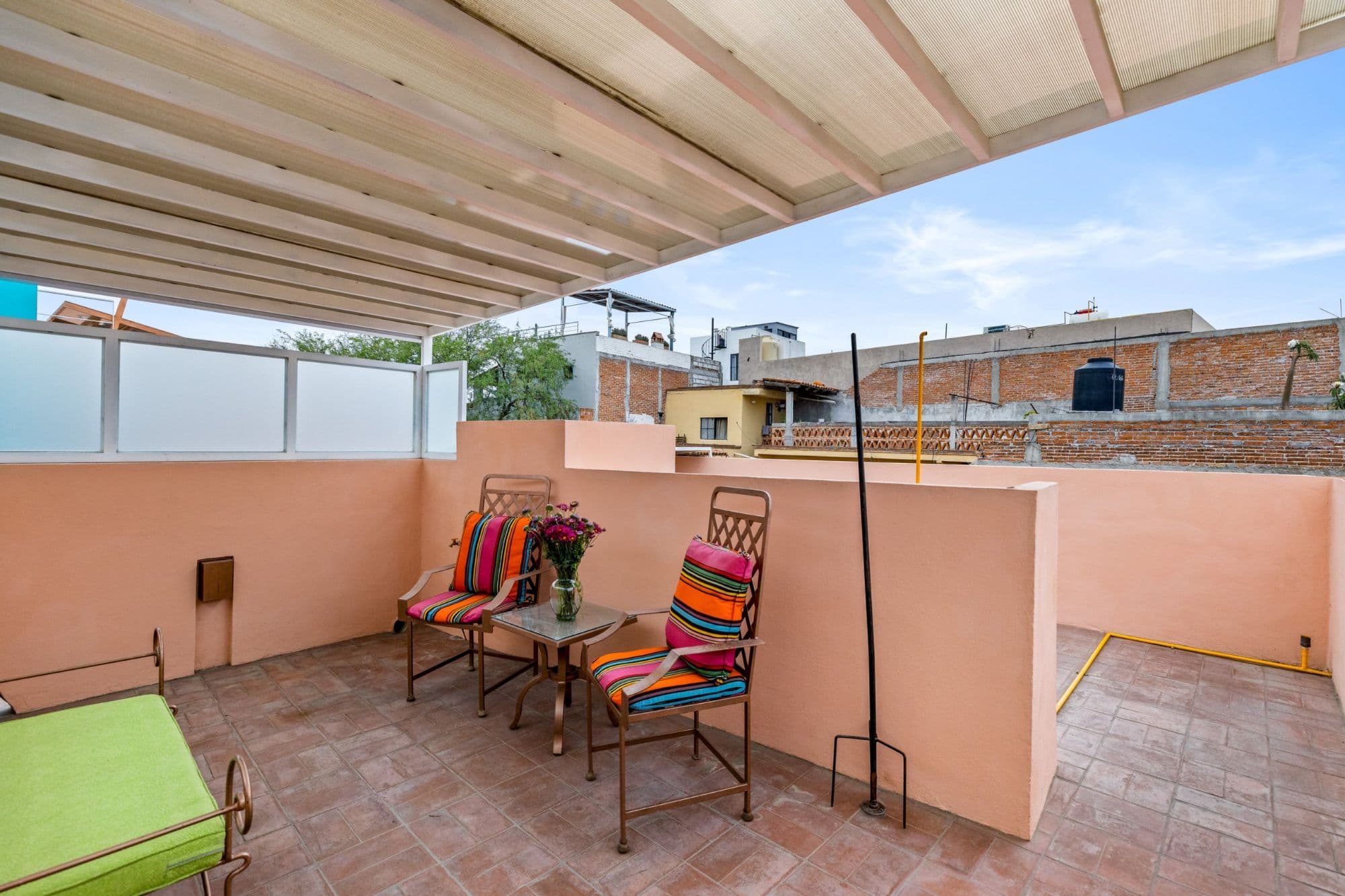 Casa la Luz — San Antonio, San Miguel de Allende — photo 21 — vibrant rooftop terrace, light-filled shade