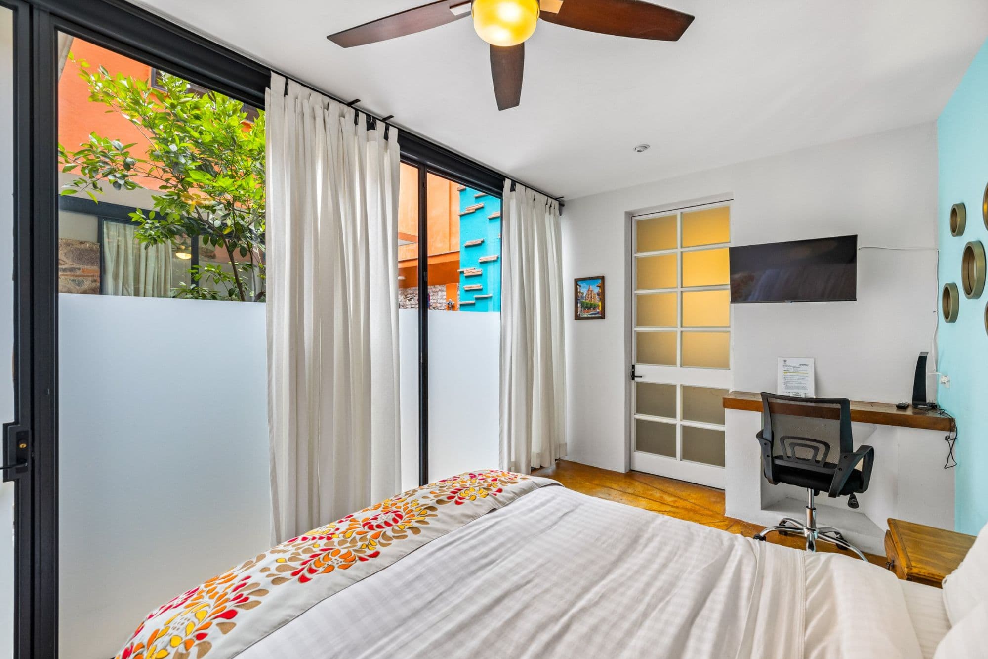 Casa la Luz — San Antonio, San Miguel de Allende — photo 27 — luminous master suite, vibrant city views