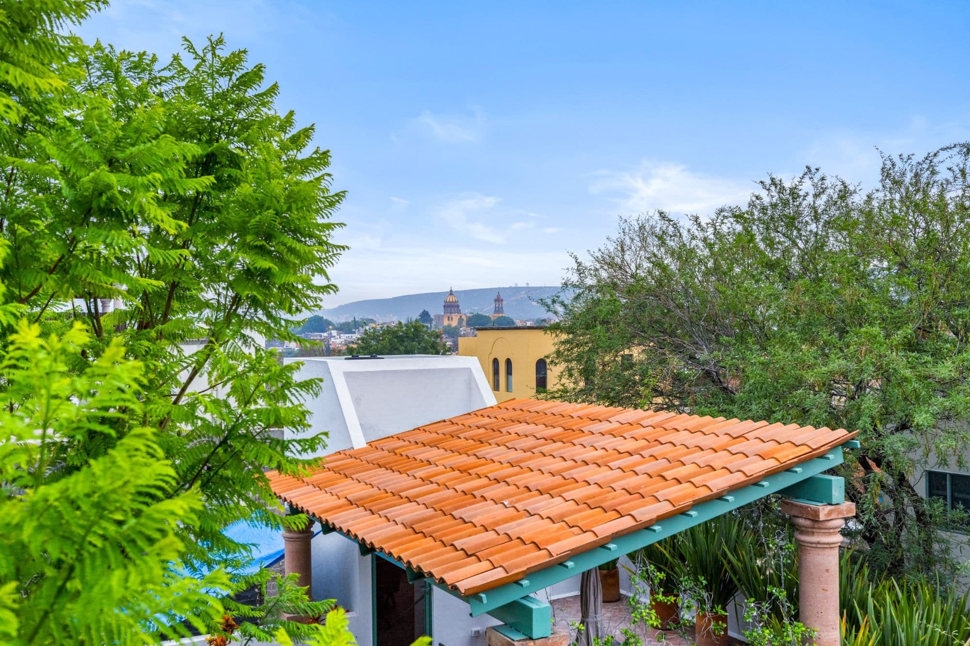Casa la Luz — San Antonio, San Miguel de Allende — photo 12 — charming terracotta-roofed garden casita