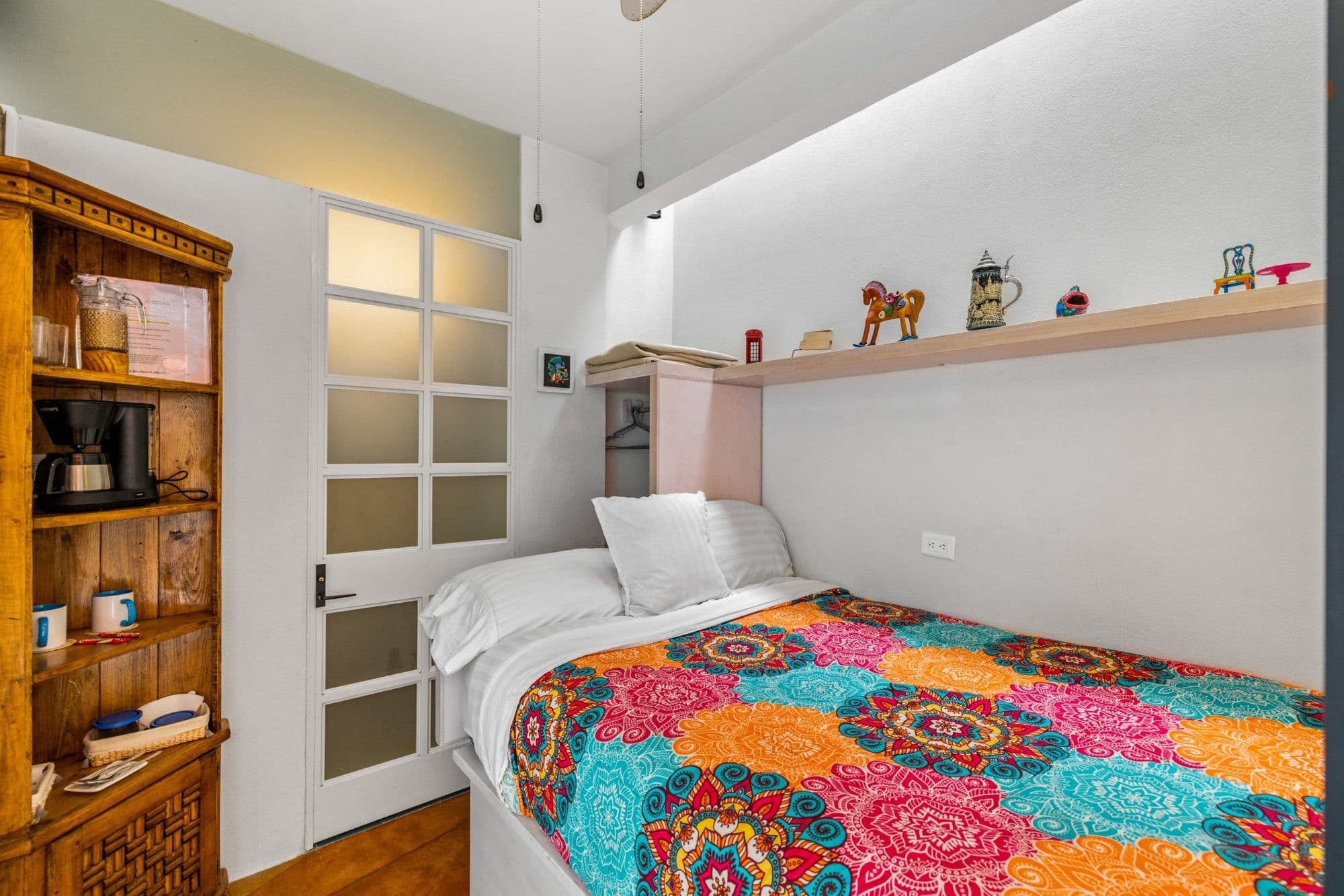 Casa la Luz — San Antonio, San Miguel de Allende — photo 30 — charming bedroom, vibrant bohemian comfort