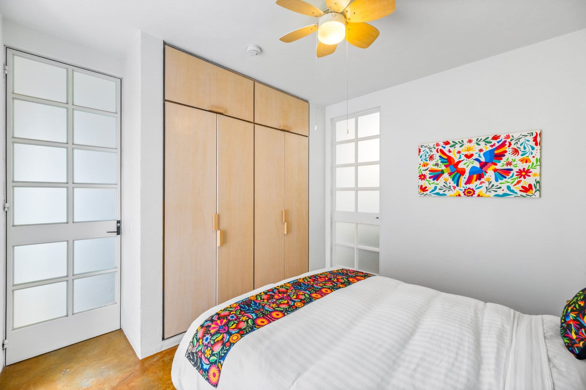 Casa la Luz — San Antonio, San Miguel de Allende — photo 18 — bright primary bedroom with artisanal accents