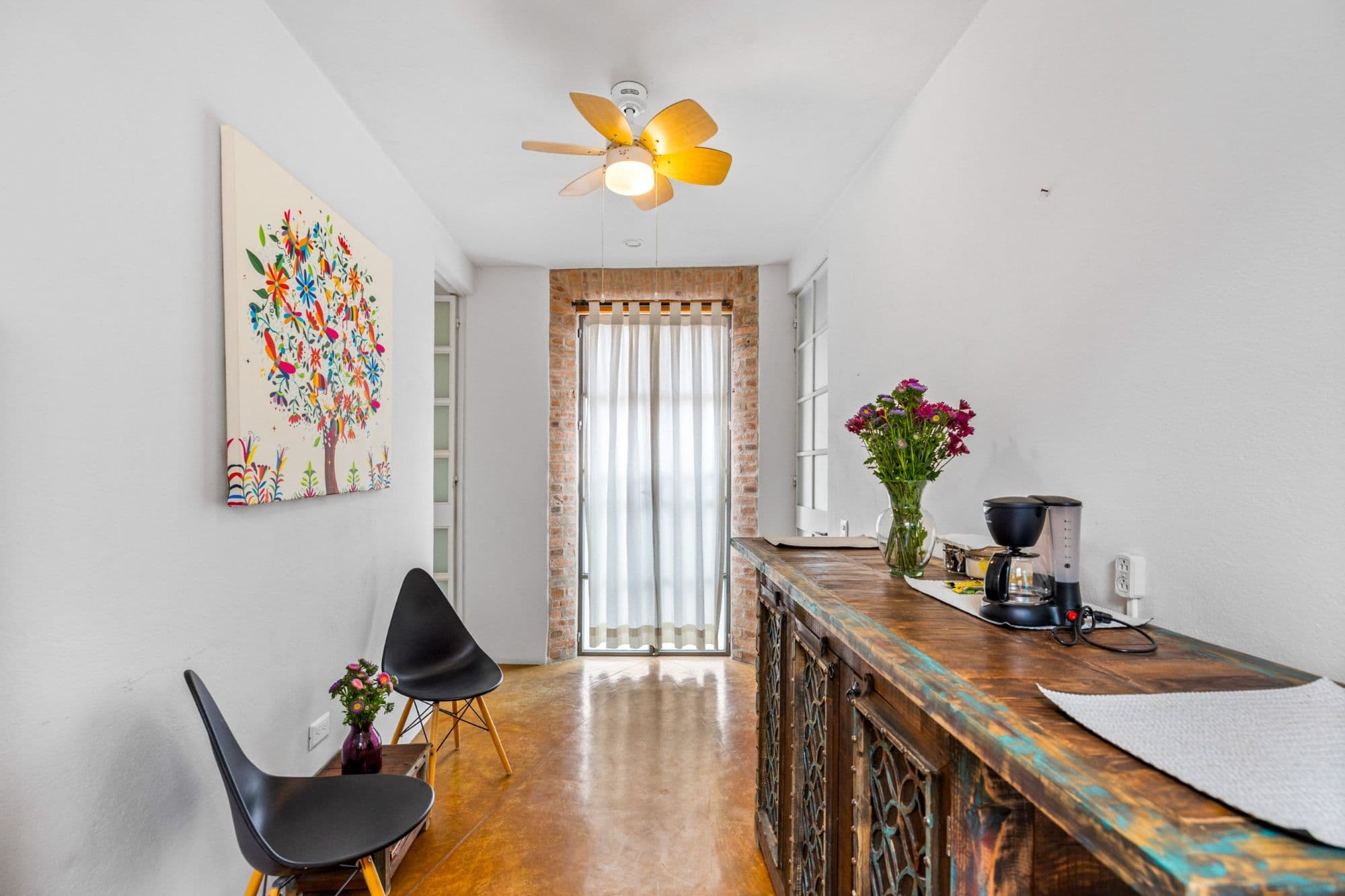 Casa la Luz — San Antonio, San Miguel de Allende — photo 16 — bright, artful kitchen with rustic charm