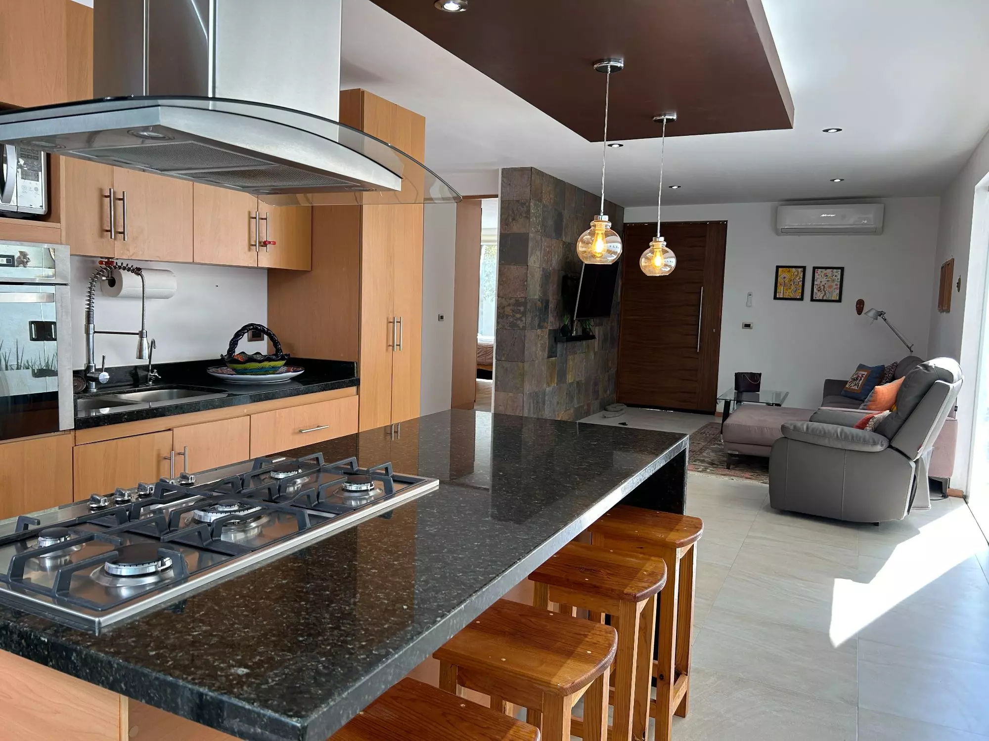 Casa Gamaliel — El Paraiso, San Miguel de Allende — photo 5 — contemporary chef's kitchen with seamless living integration