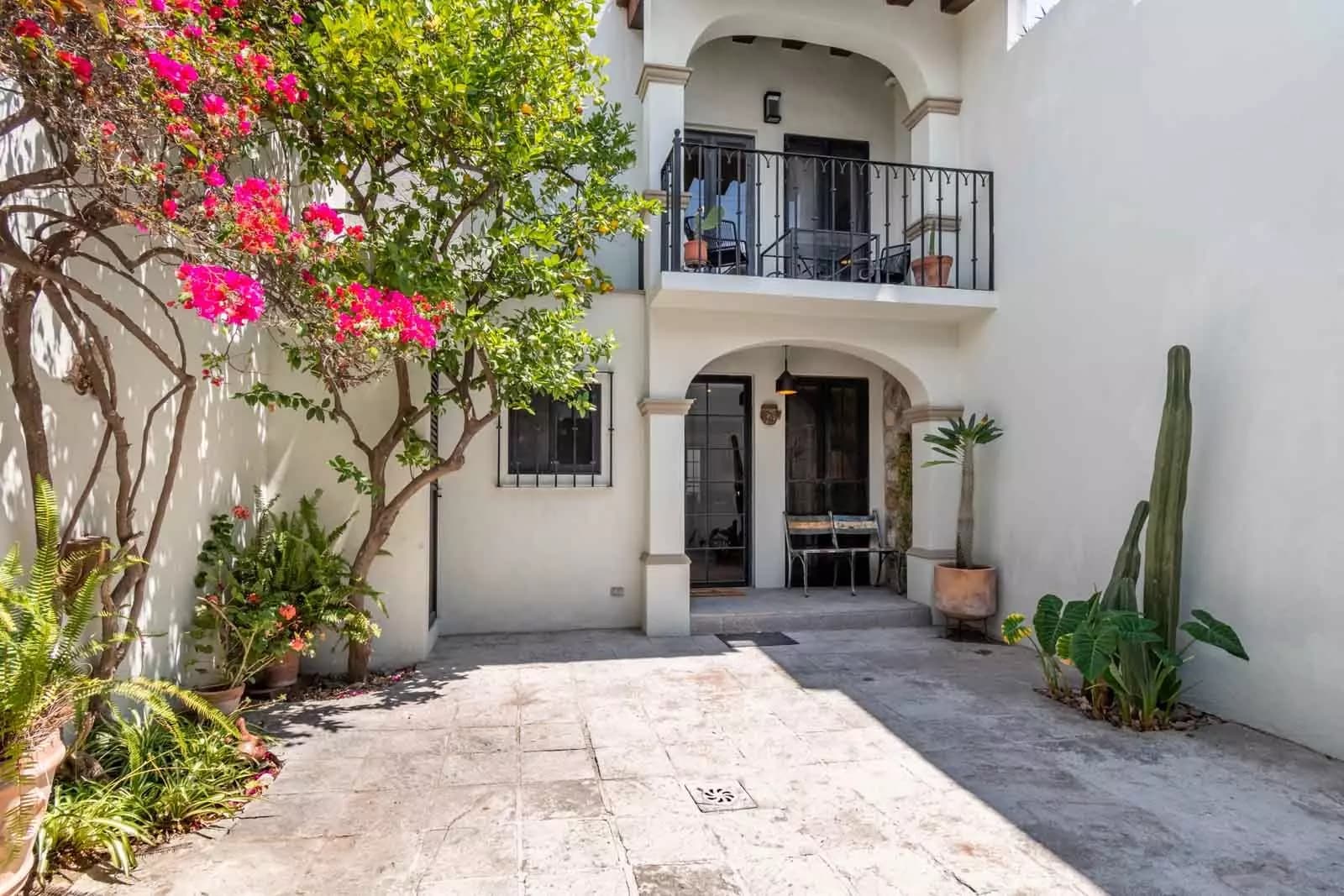 CASA OLIVO — Guadalupe, San Miguel de Allende — photo 22 — charming courtyard, blooming bougainvillea elegance