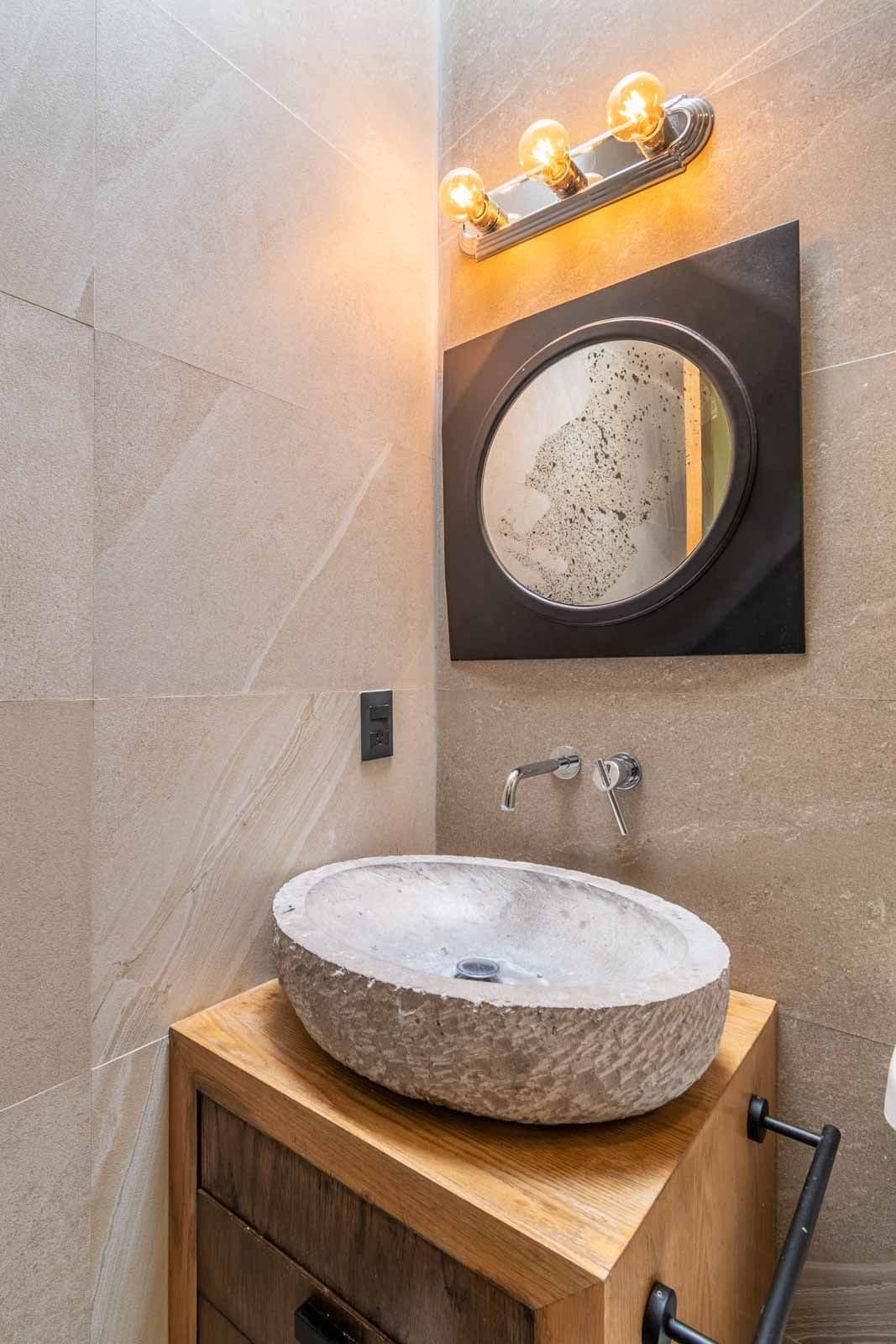 Casa Refugio — Villa de los Frailes, San Miguel de Allende — photo 18 — artisanal stone basin, ambient lighting elegance