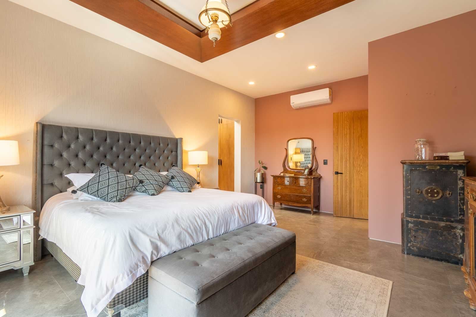 Casa Refugio — Villa de los Frailes, San Miguel de Allende — photo 20 — sophisticated master suite, warm architectural elegance