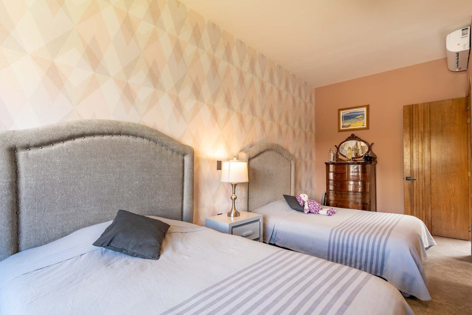 Casa Refugio — Villa de los Frailes, San Miguel de Allende — photo 15 — elegant dual beds, warm ambient lighting