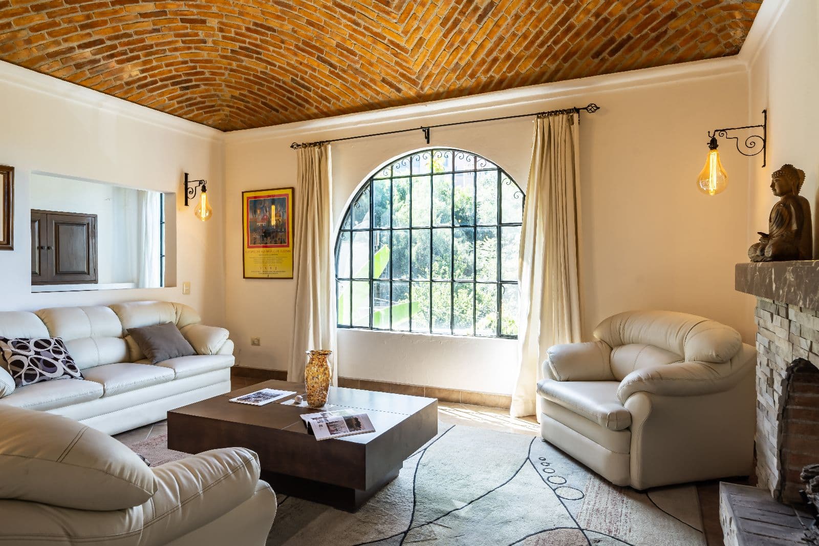 Casa Shangri-La — Centro, San Miguel de Allende — photo 19 — luminous living room, soaring brick ceilings