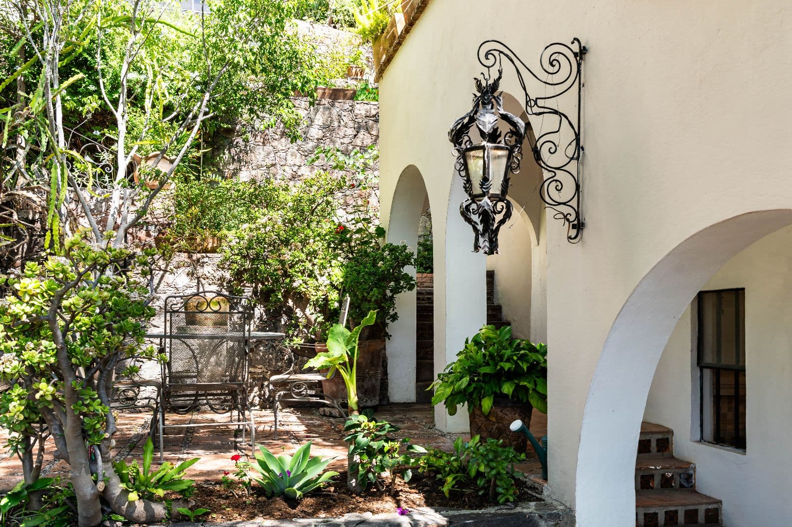 Casa Shangri-La — Centro, San Miguel de Allende — photo 18 — charming courtyard with ornamental iron details