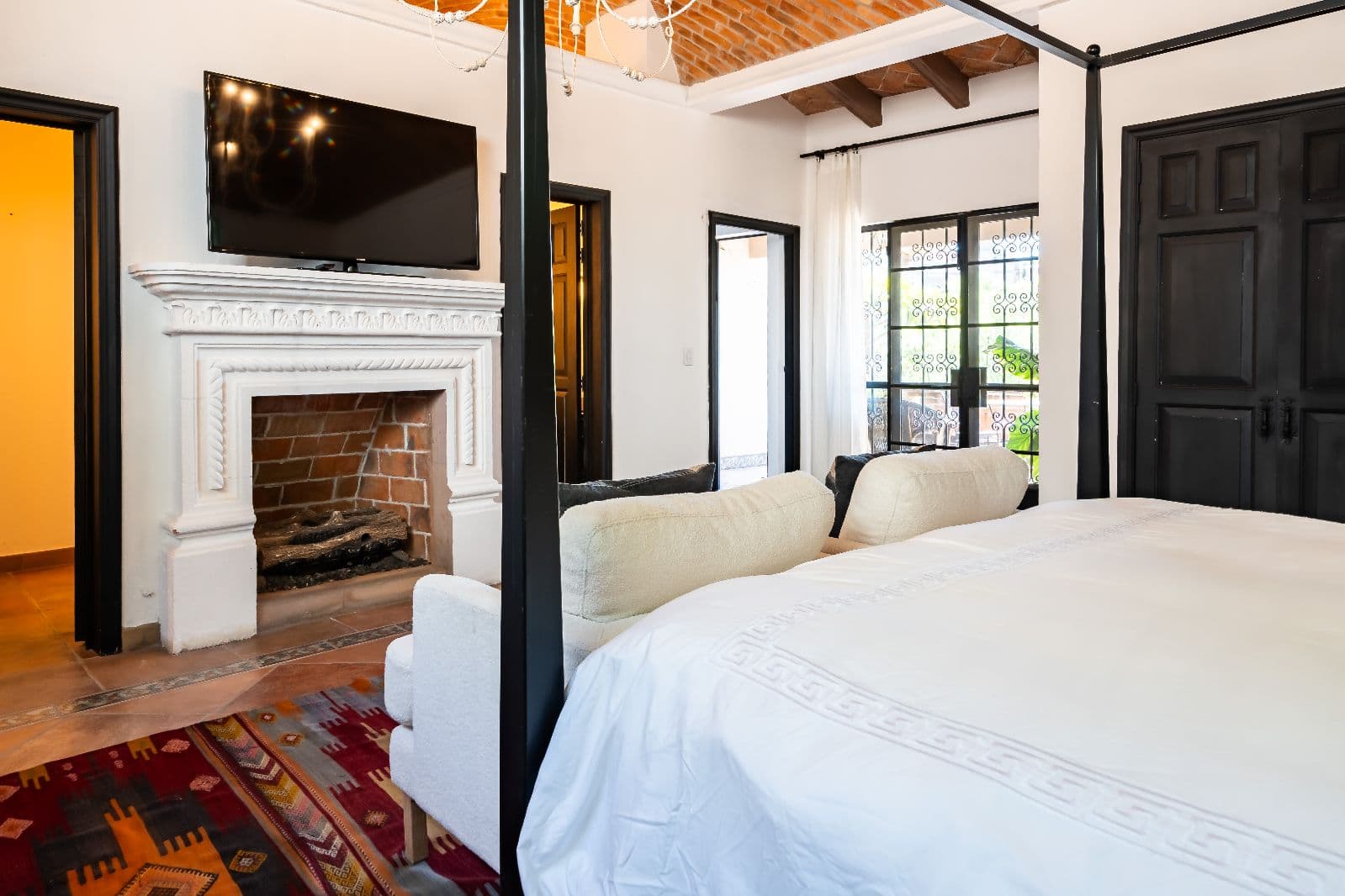 Casa Shangri-La — Centro, San Miguel de Allende — photo 12 — elegant master suite, fireside luxury