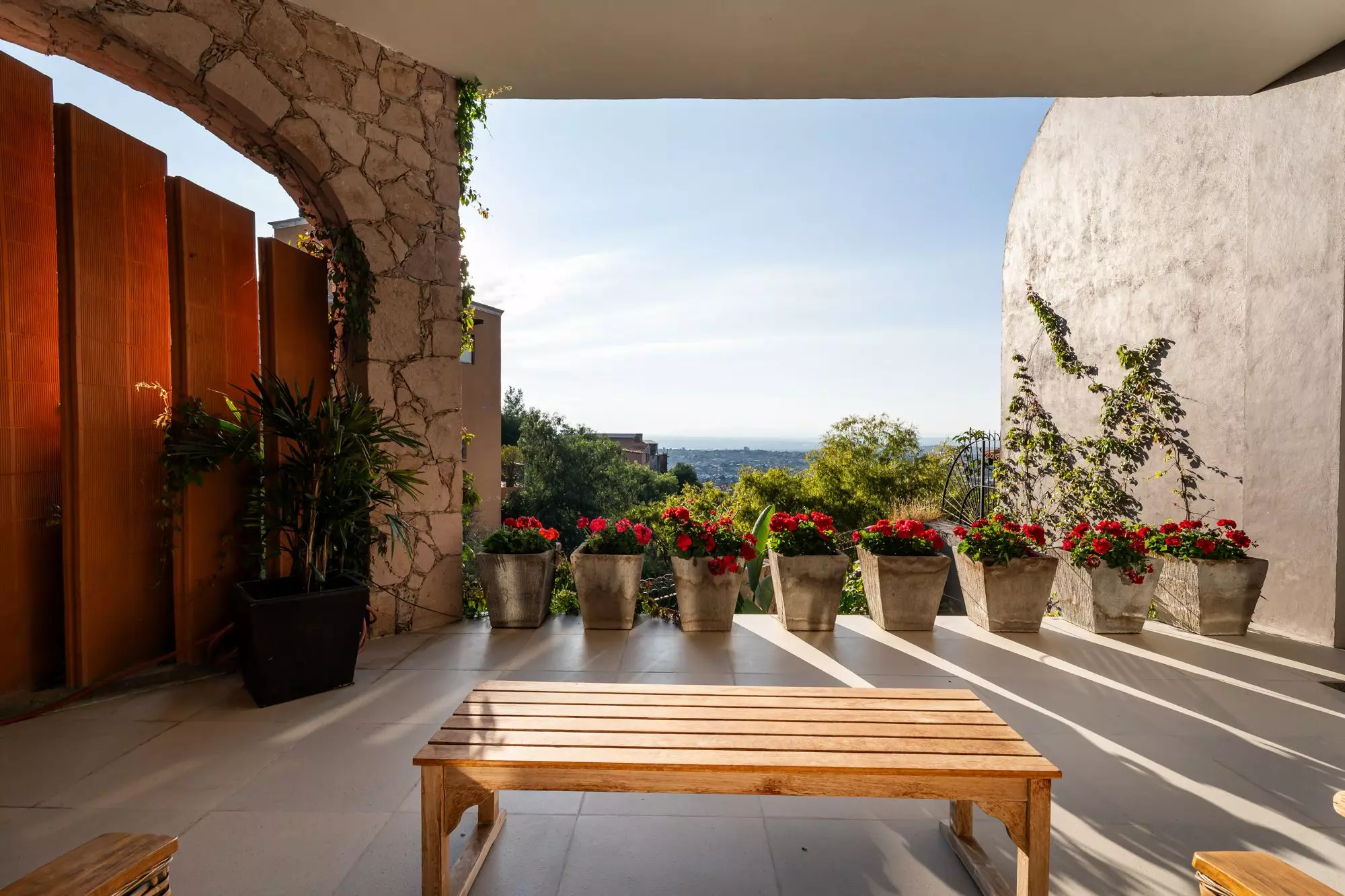 Casa Bella Vista — Balcones, San Miguel de Allende — photo 12 — panoramic hillside terrace, curated blooms