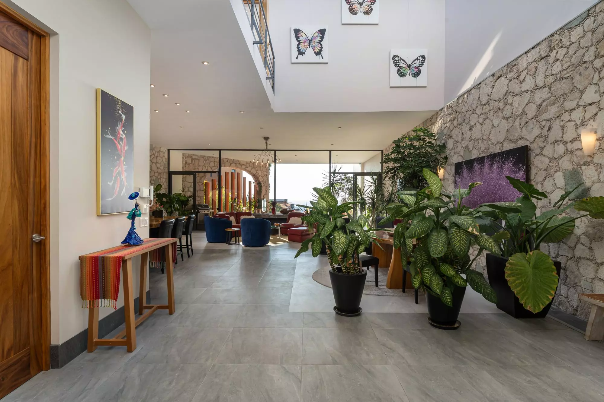 Casa Bella Vista — Balcones, San Miguel de Allende — photo 23 — sophisticated atrium with soaring skylight elegance