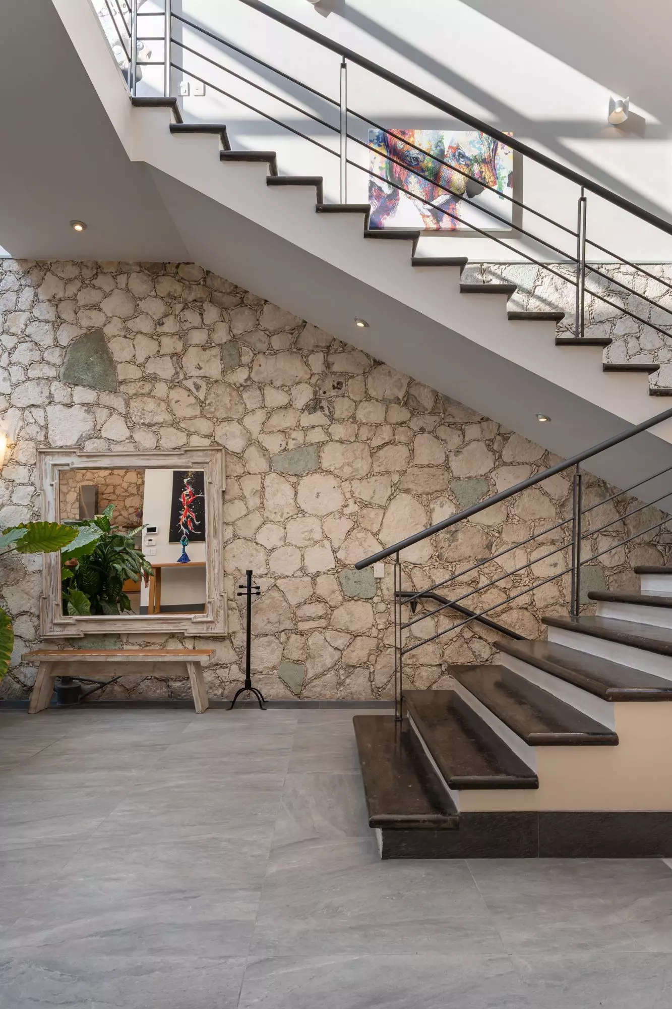 Casa Bella Vista — Balcones, San Miguel de Allende — photo 27 — soaring light-filled staircase with rustic charm