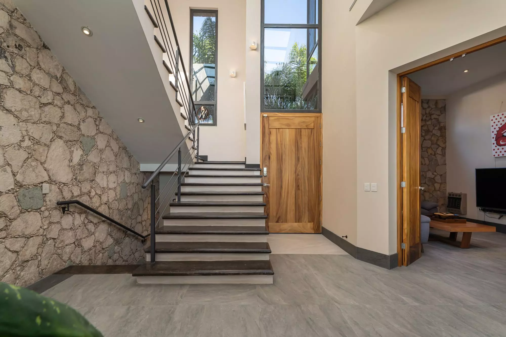 Casa Bella Vista — Balcones, San Miguel de Allende — photo 29 — contemporary staircase with soaring natural light
