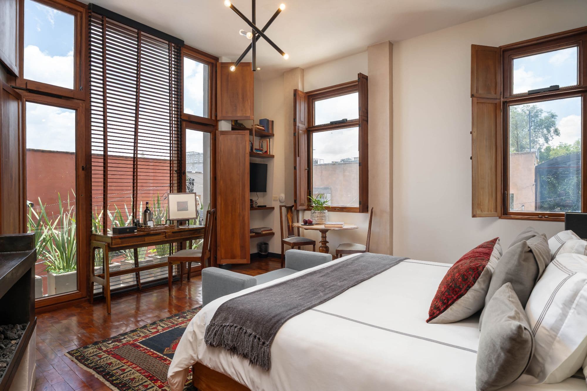 The Lofts — Centro, San Miguel de Allende — photo 22 — serene primary suite, abundant natural light