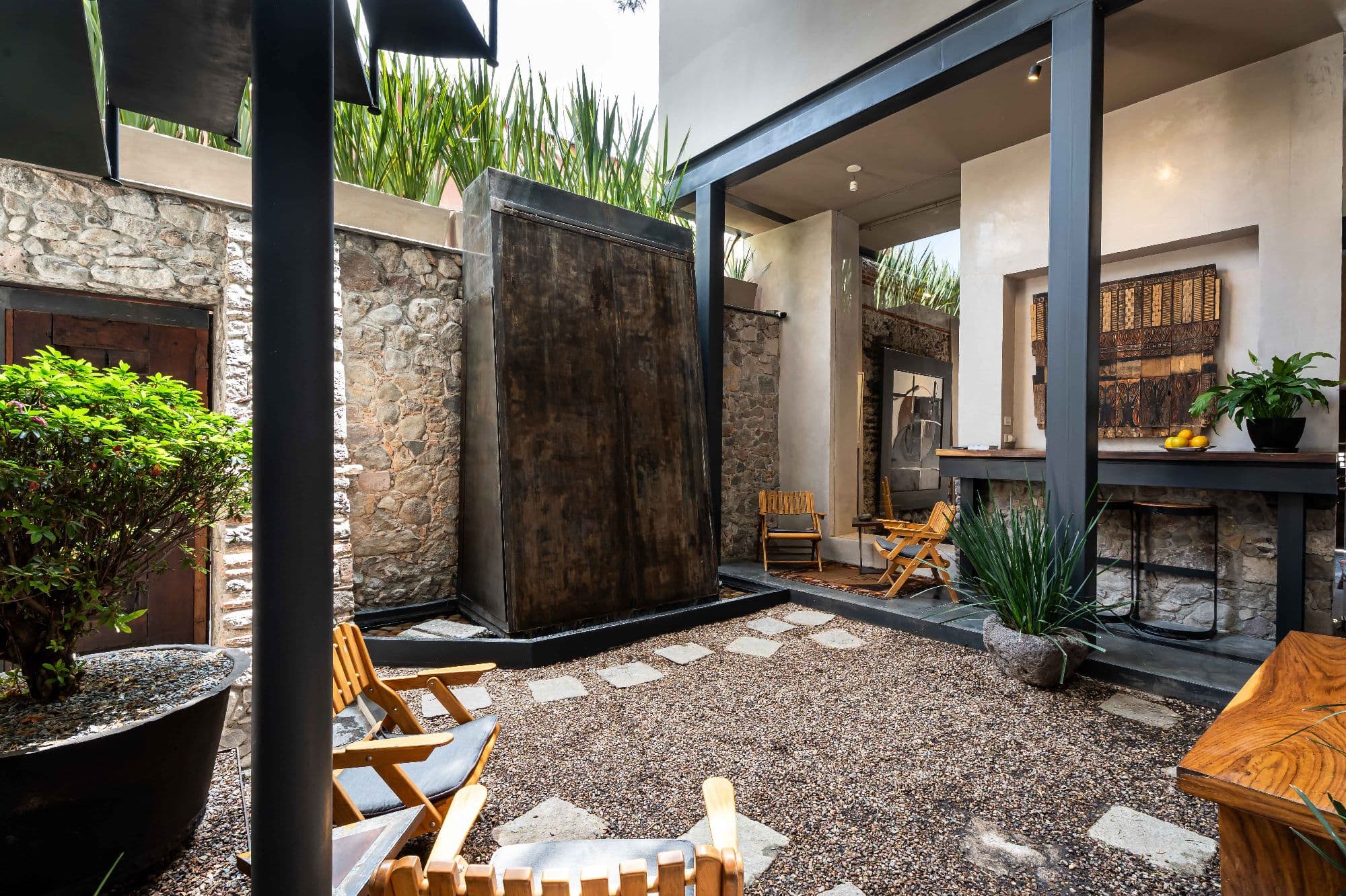 The Lofts — Centro, San Miguel de Allende — photo 26 — serene courtyard with authentic stone charm