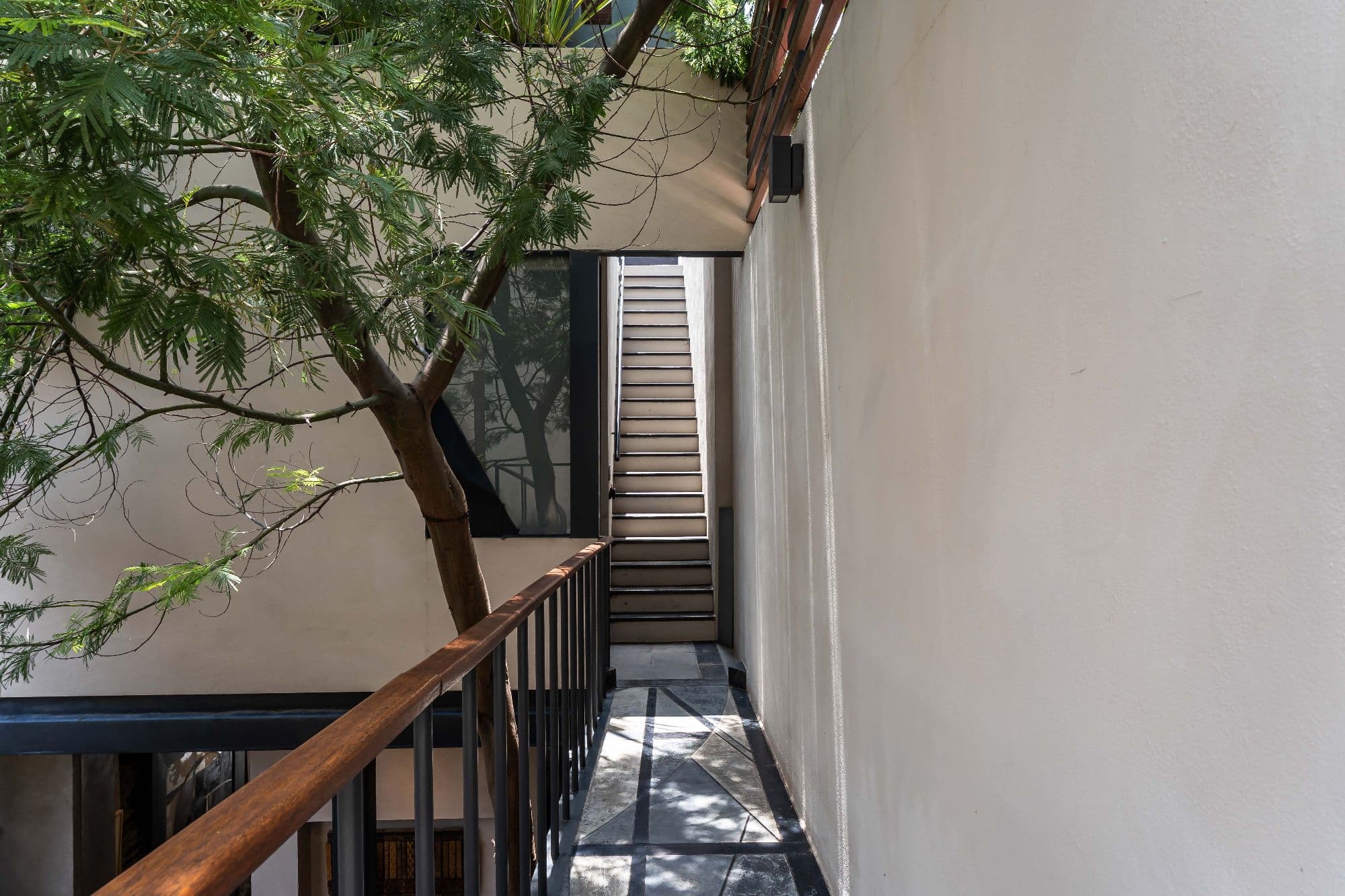 The Lofts — Centro, San Miguel de Allende — photo 21 — charming stairwell with dappled natural light