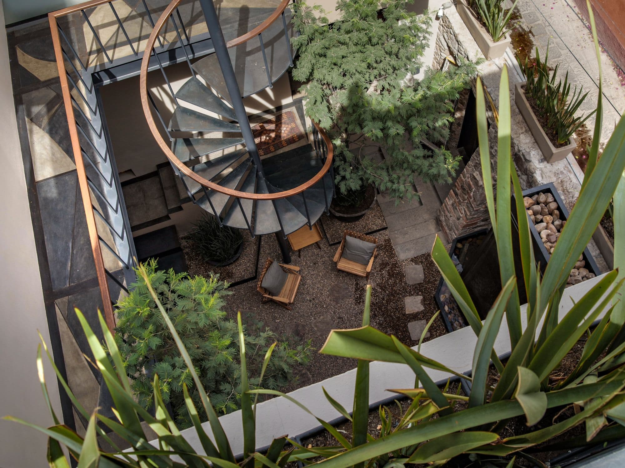 The Lofts — Centro, San Miguel de Allende — photo 5 — serene courtyard oasis, sculptural design elements